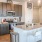 a kitchen with a marble island