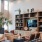 a living room with a large bookcase and a large television
